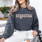 A cute sweatshirt with Mama written across the chest filled with a floral pattern. It comes in ash grey, dark grey, and pink.